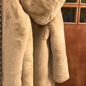 Worn once beautiful faux fur appraise jacket with eyelet closure and hood
